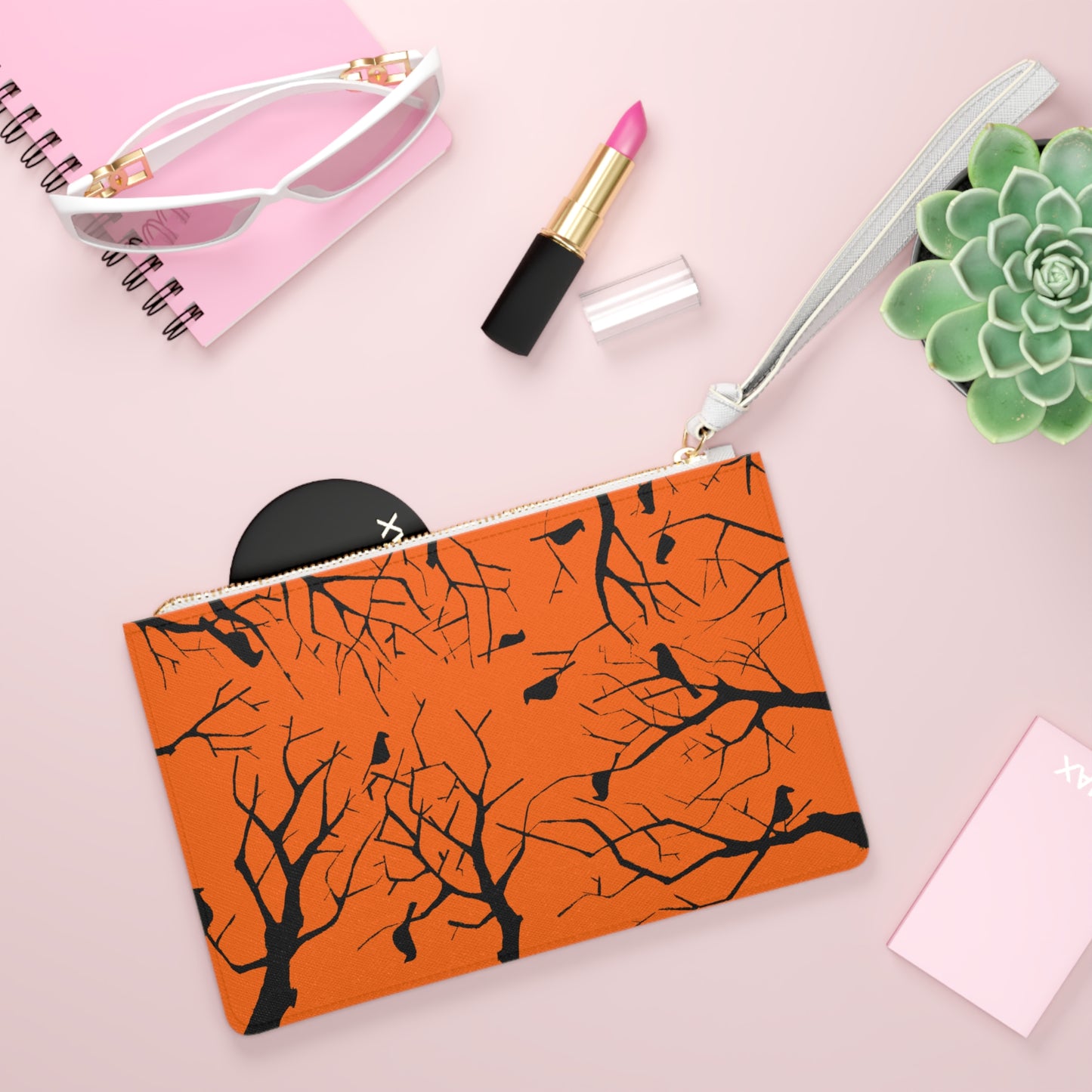 Birds in Trees Art Piece with a Dark Orange Background on an Adorable Clutch Bag