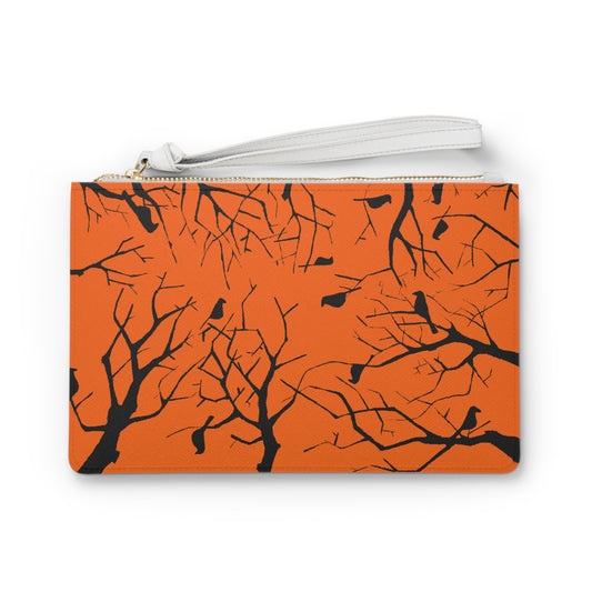 Birds in Trees Art Piece with a Dark Orange Background on an Adorable Clutch Bag