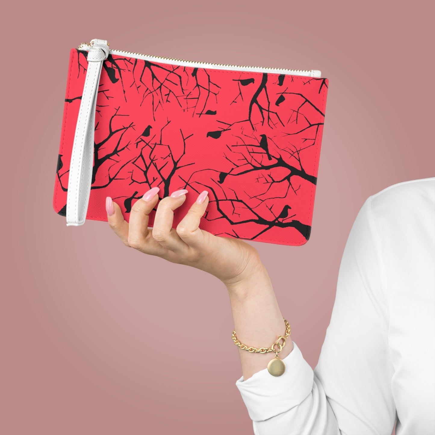 Birds in Trees Art Piece With A Salmon Colored Background on The Perfect Clutch Bag